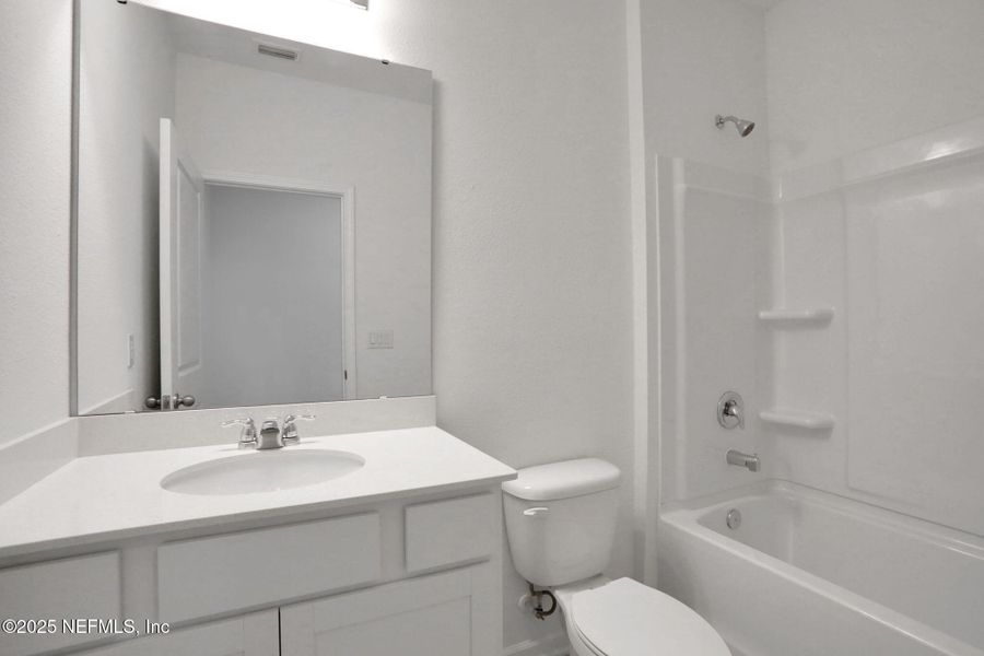 Furnished interior view inside a new home in Cordova Palms, St. Augustine (Image 13).