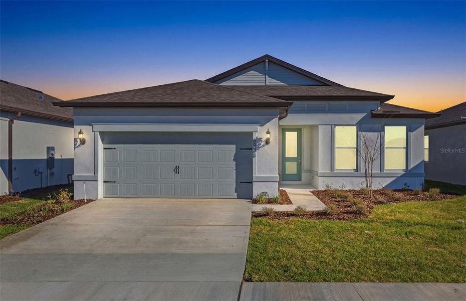 Front exterior of a new home in Pioneer Ranch, Ocala, FL, highlighting curb appeal (Image 2). Front exterior of a new home in Pioneer Ranch, Ocala, FL, highlighting curb appeal (Image 2).