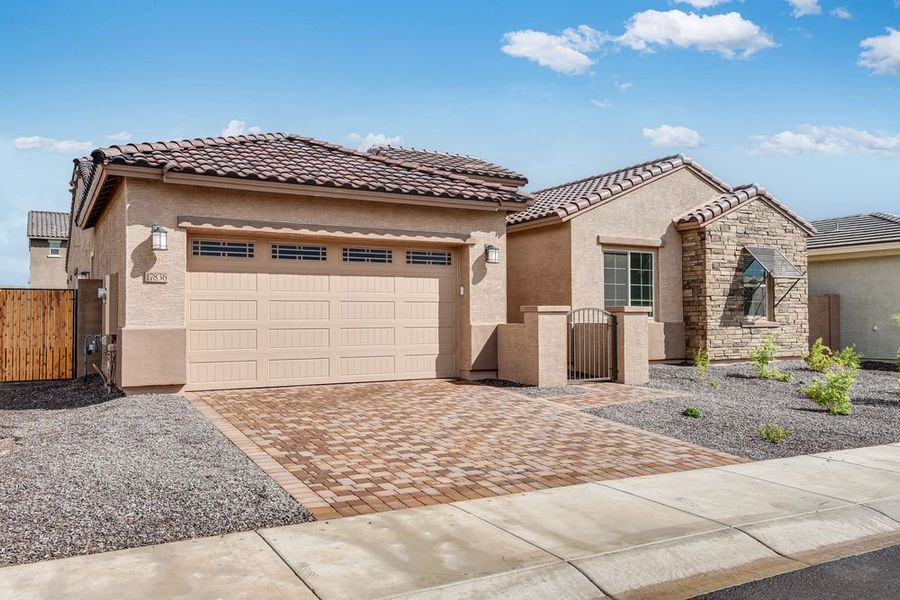 Representative exterior photo of a completed home built from the Bradshaw by Taylor Morrison in Allen Ranches, Litchfield Park, AZ (Image 21).