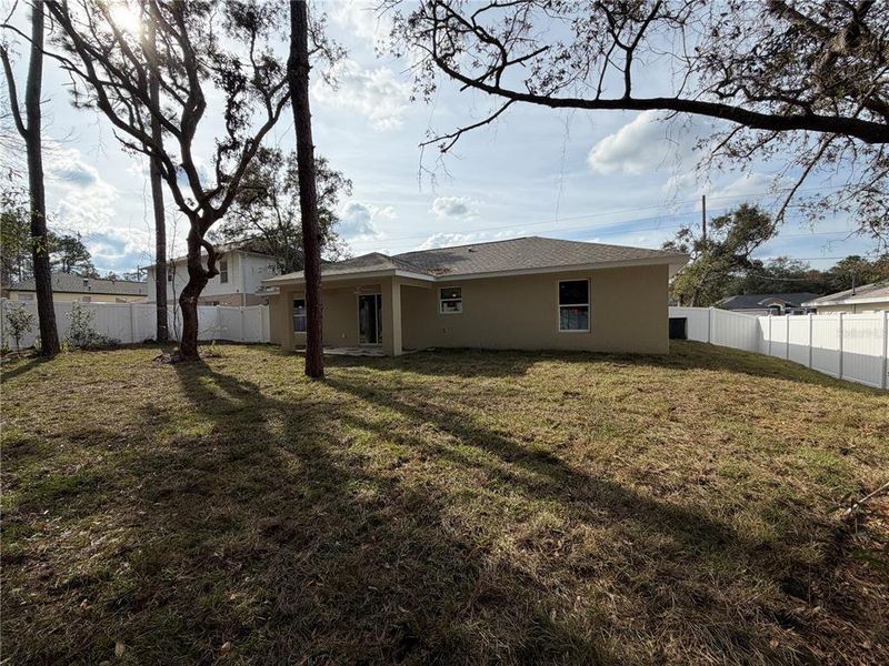 Exterior details and patio area of a home in , Citrus Springs (Image 3).