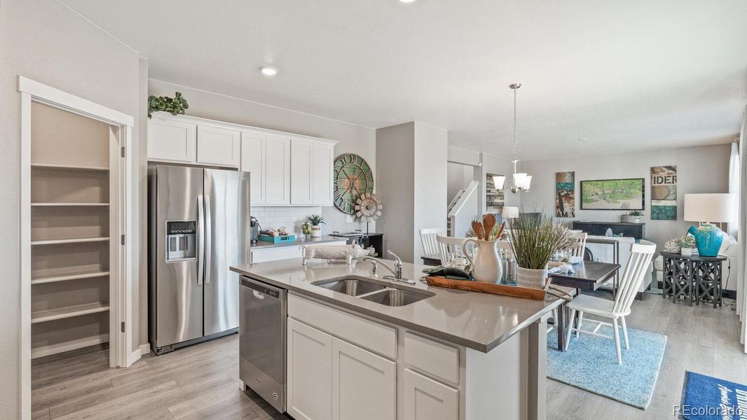 Furnished interior view inside a new home in Trails at Crowfoot, Parker (Image 11).