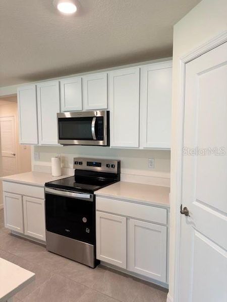 Furnished interior view inside a new home in Hernando County Spot Lots, Spring Hill (Image 12).