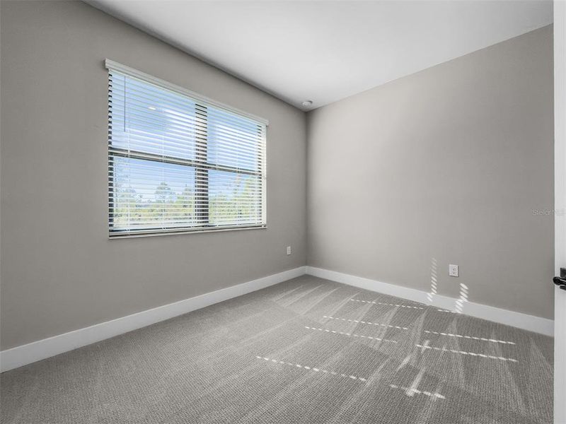 Spacious, unfurnished interior of a new home in , Port Charlotte (Image 13).