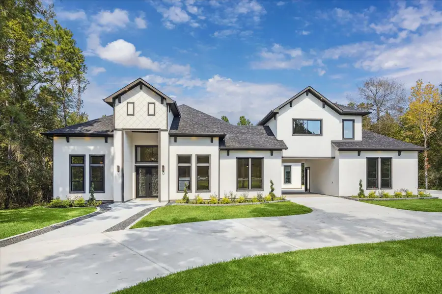 Front exterior of a new home in , Montgomery, TX, highlighting curb appeal (Image 1).