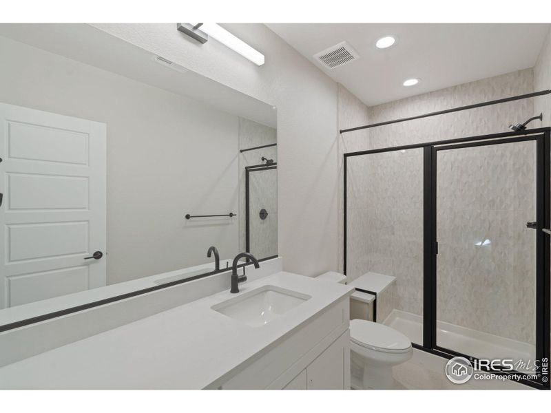 Basement Bathroom w/ Quartz and Upgraded Tile