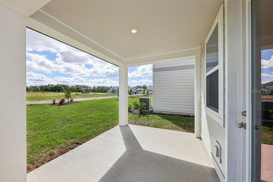 Exterior details and patio area of a home in Trailside, Mount Dora (Image 2). Exterior details and patio area of a home in Trailside, Mount Dora (Image 2).