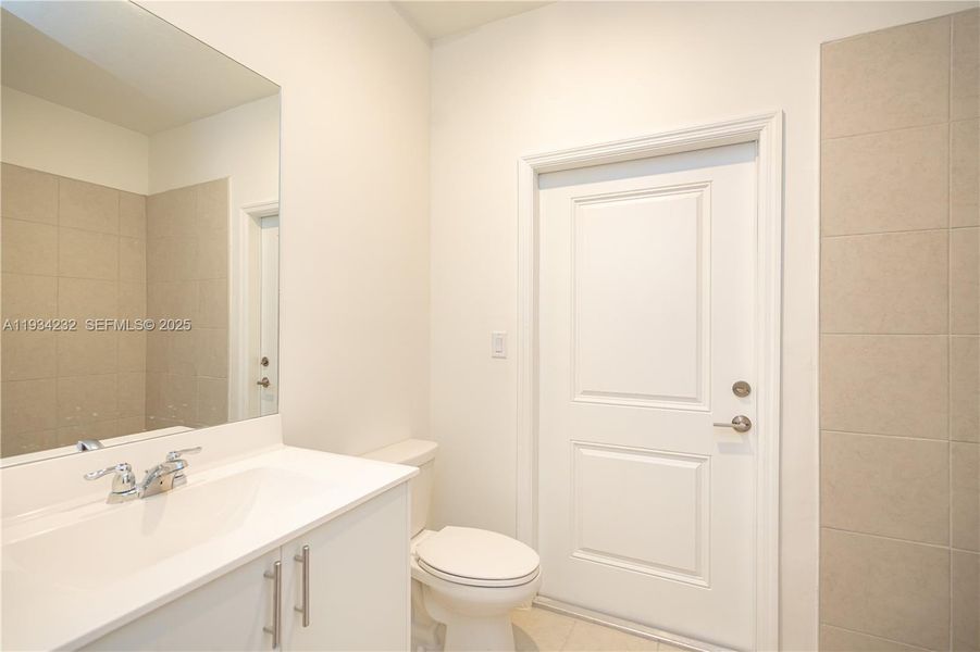 Furnished interior view inside a new home in Acacia Groves, Miami (Image 15).