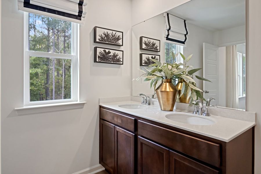 Dual-sink vanity at primary bath
