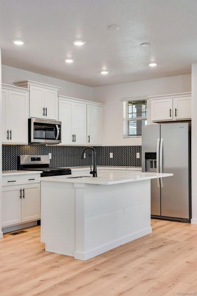 Furnished interior view inside a new home in Horizon Uptown, Aurora (Image 14). Furnished interior view inside a new home in Horizon Uptown, Aurora (Image 14).