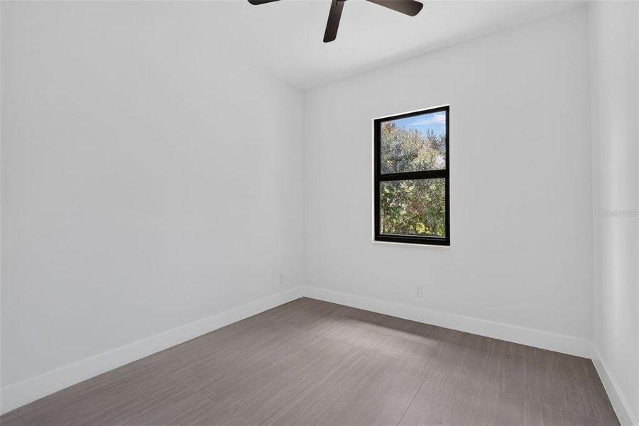 Spacious, unfurnished interior of a new home in , Port Charlotte (Image 21).