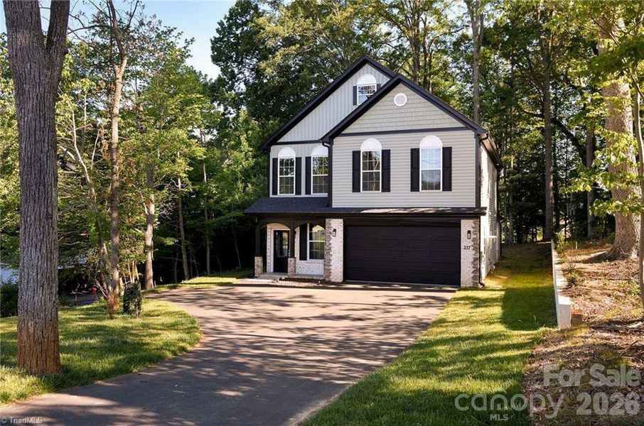 Front exterior of a new home in , Winston-Salem, NC, highlighting curb appeal (Image 2). Front exterior of a new home in , Winston-Salem, NC, highlighting curb appeal (Image 2).