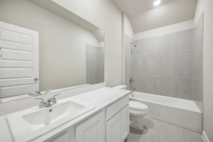 Bathroom in the Wimbledon home plan by Trophy Signature Homes – REPRESENTATIVE PHOTO Bathroom in the Wimbledon home plan by Trophy Signature Homes – REPRESENTATIVE PHOTO
