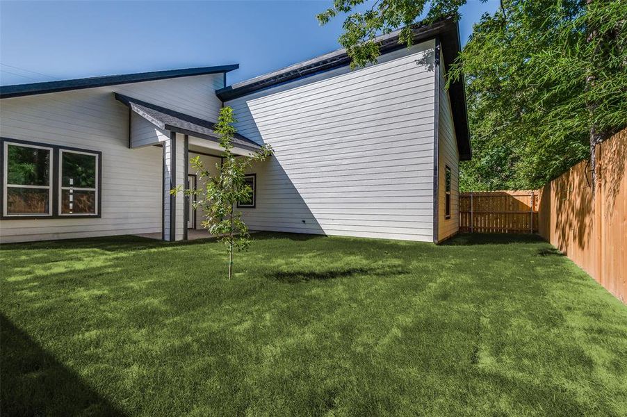 Back of property with a fenced backyard Back of property with a fenced backyard