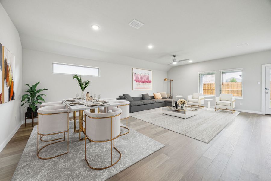 Dining and Living Room in the Hayden home plan by Trophy Signature Homes – REPRESENTATIVE PHOTO