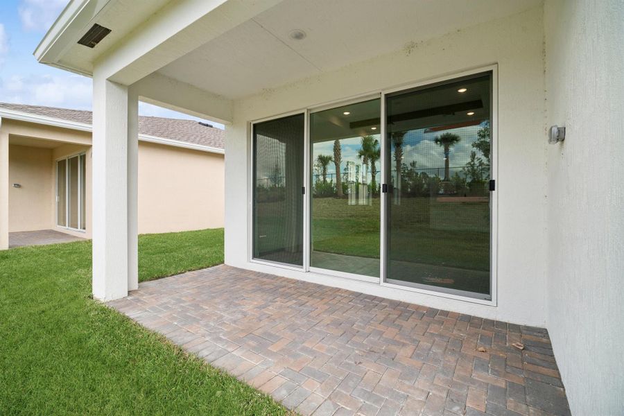 Front exterior of a new home in , Port St. Lucie, FL, highlighting curb appeal (Image 2).