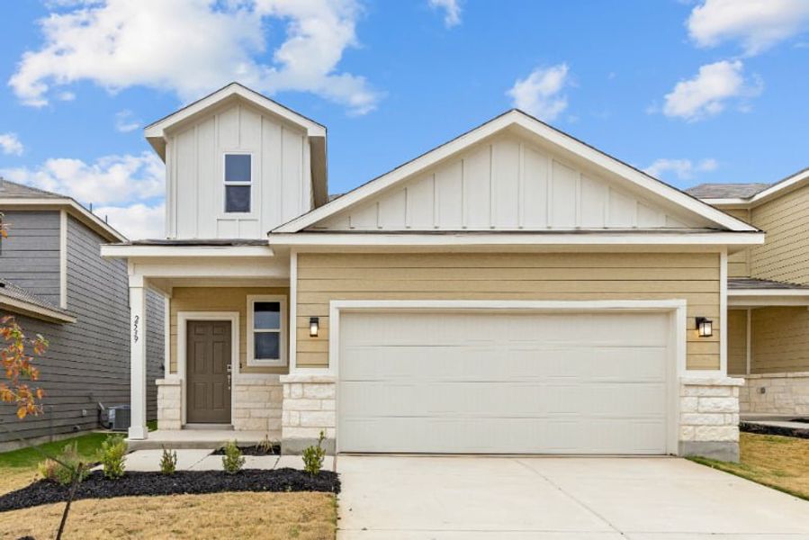 Front exterior of a new home in Hacienda, San Antonio, TX, highlighting curb appeal (Image 1).