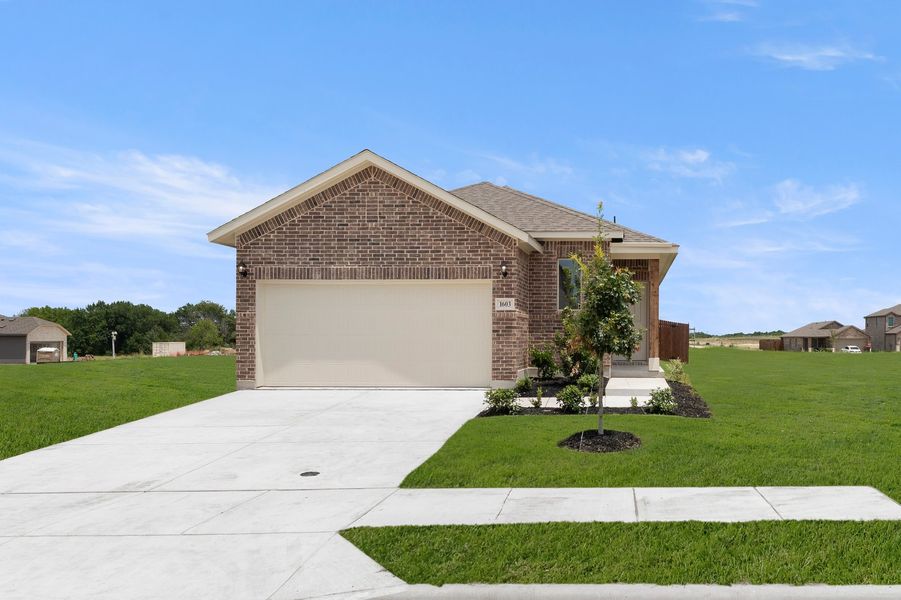 Front exterior of a new home in Creekside Ranch, Blue Ridge, TX, highlighting curb appeal (Image 1). Front exterior of a new home in Creekside Ranch, Blue Ridge, TX, highlighting curb appeal (Image 1).