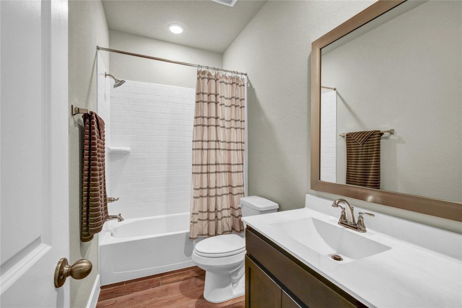 Secondary bath with combined tub/shower combo Secondary bath with combined tub/shower combo