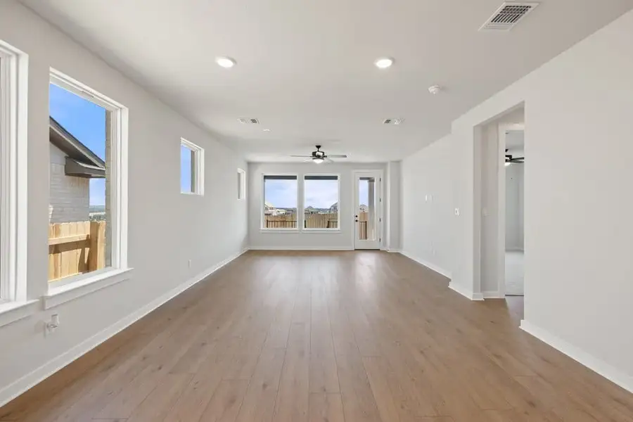 Spacious, unfurnished interior of a new home in Lariat, Liberty Hill (Image 17). Spacious, unfurnished interior of a new home in Lariat, Liberty Hill (Image 17).