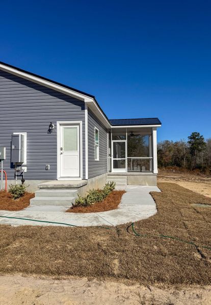 Exterior details and patio area of a home in , Walterboro (Image 12).