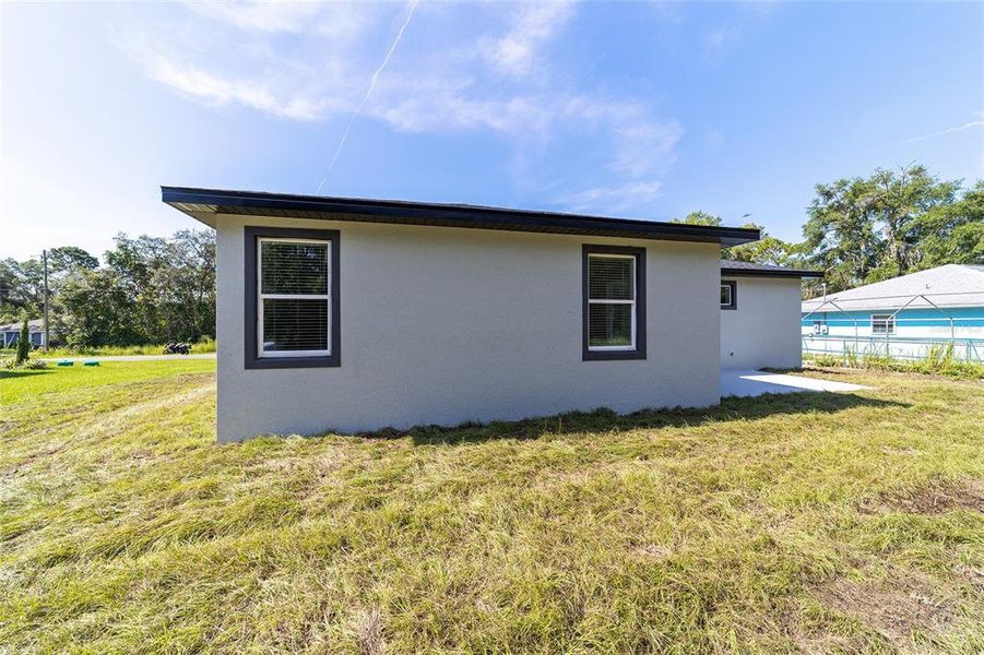 Front exterior of a new home in , Ocala, FL, highlighting curb appeal (Image 24).