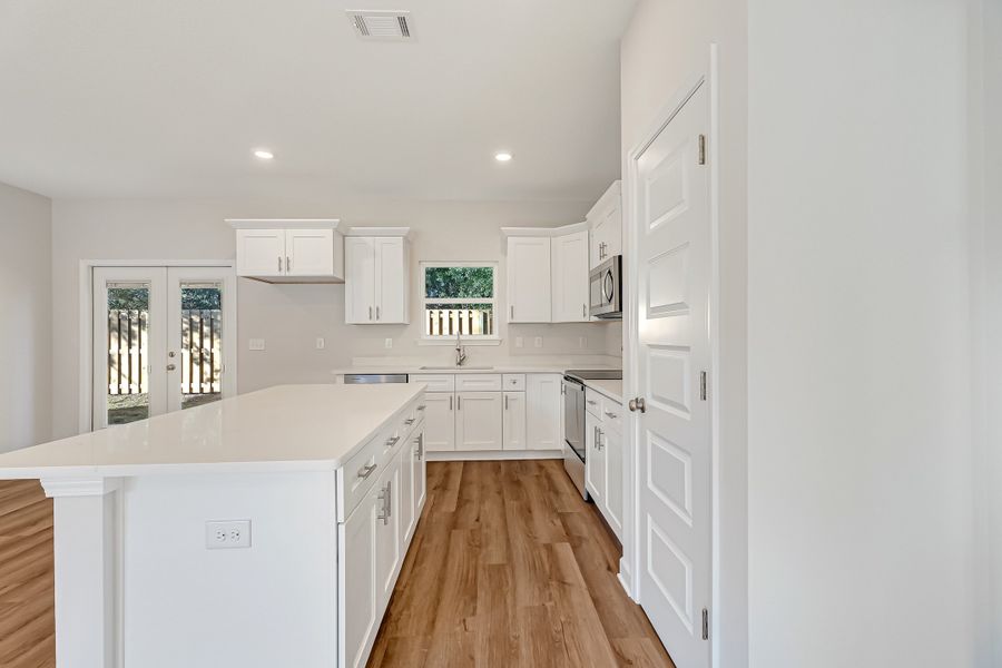 Furnished interior view inside a new home in Live Oak Cottages, Freeport (Image 13). Furnished interior view inside a new home in Live Oak Cottages, Freeport (Image 13).
