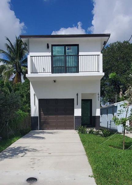 Front exterior of a new home in , Fort Lauderdale, FL, highlighting curb appeal (Image 13). Front exterior of a new home in , Fort Lauderdale, FL, highlighting curb appeal (Image 13).
