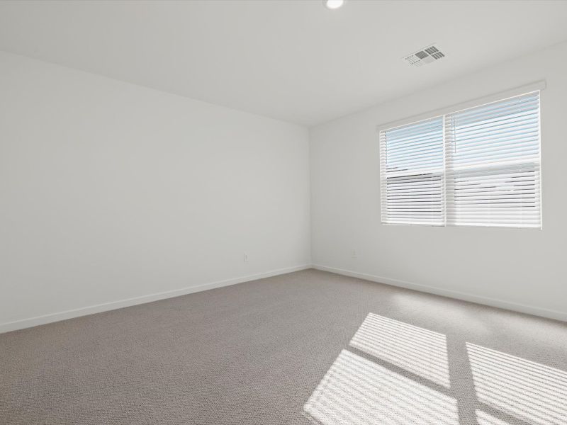 Spacious, unfurnished interior of a new home in Rancho Mirage Signature Series, Maricopa (Image 8).