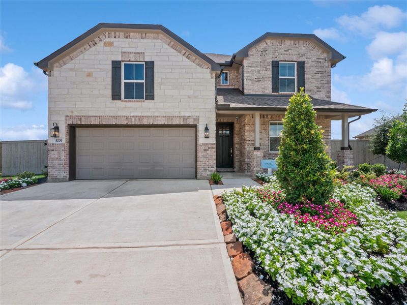 Gorgeous Omaha home design with elevation TA built by K. Hovnanian Homes in beautiful Westland Ranch.
