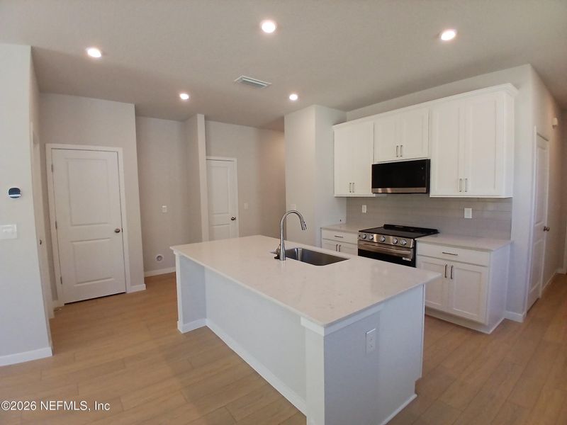 Furnished interior view inside a new home in Seminole Palms, Palm Coast (Image 3).