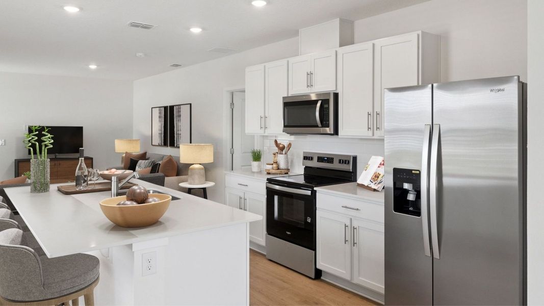 Furnished interior view inside a new home in Crossroads at Kelly Park, Apopka (Image 6).