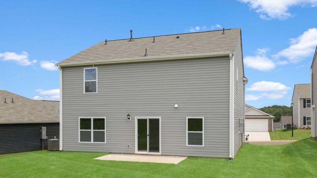 Exterior details and patio area of a home in Treemont Commons, Wellford (Image 21).