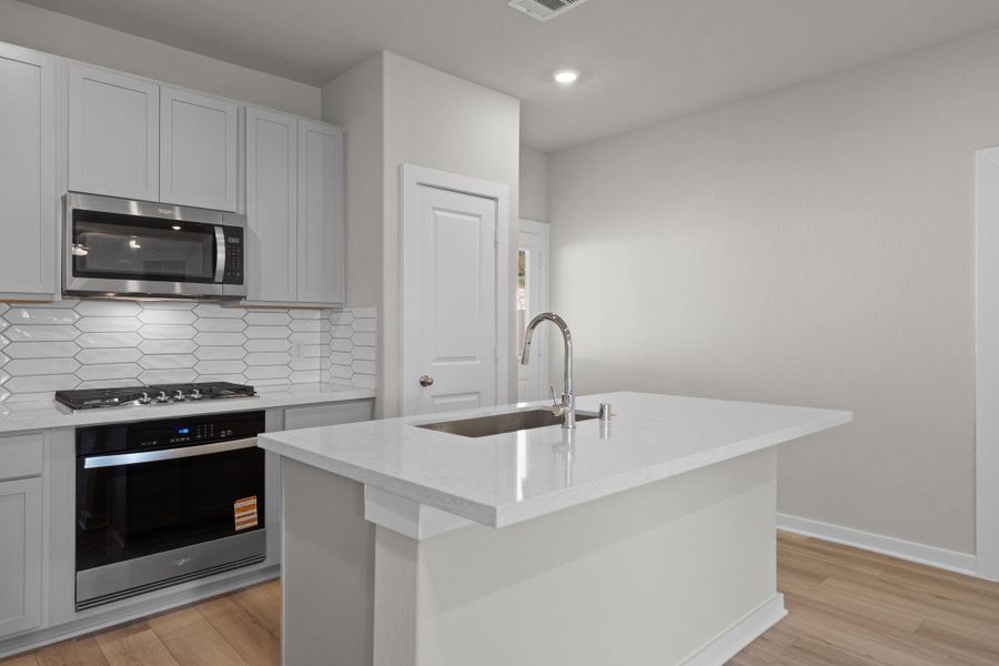 Furnished interior view inside a new home in Westridge Cove, Conroe (Image 5).