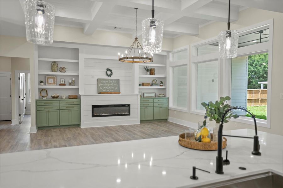 Open Concept Design Anchors Families Together with Additional Seating at the Island.