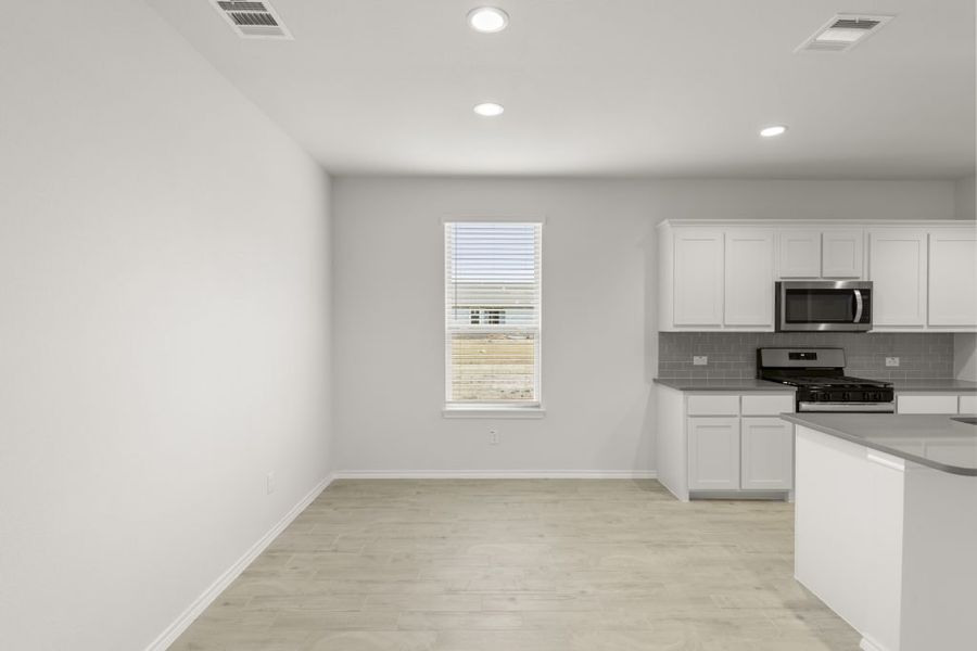 Representative exterior photo of a completed home built from the Maple by Impression Homes in Northspur, Terrell, TX (Image 9).