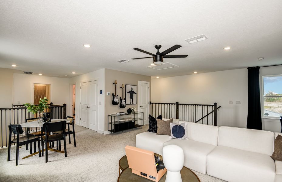 Furnished interior view inside a new home in Longmeadow at North River Ranch, Parrish (Image 9).