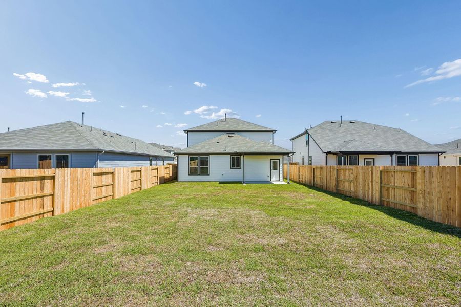 Exterior details and patio area of a home in Mavera, Conroe (Image 3).