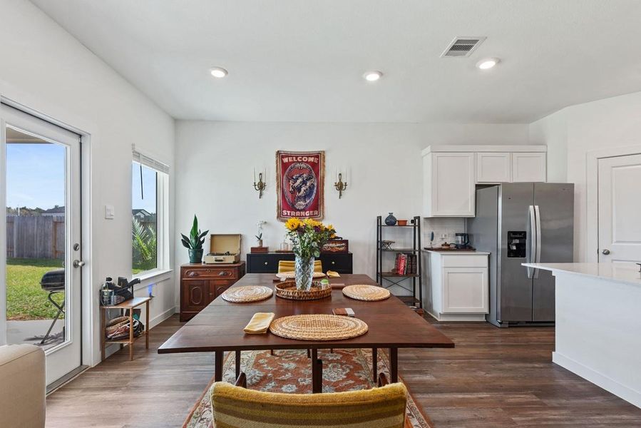 Great open flow from the kitchen to the breakfast area.