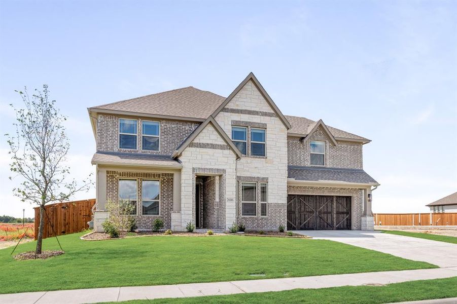Front exterior of a new home in Terracina, Rockwall, TX, highlighting curb appeal (Image 1). Front exterior of a new home in Terracina, Rockwall, TX, highlighting curb appeal (Image 1).