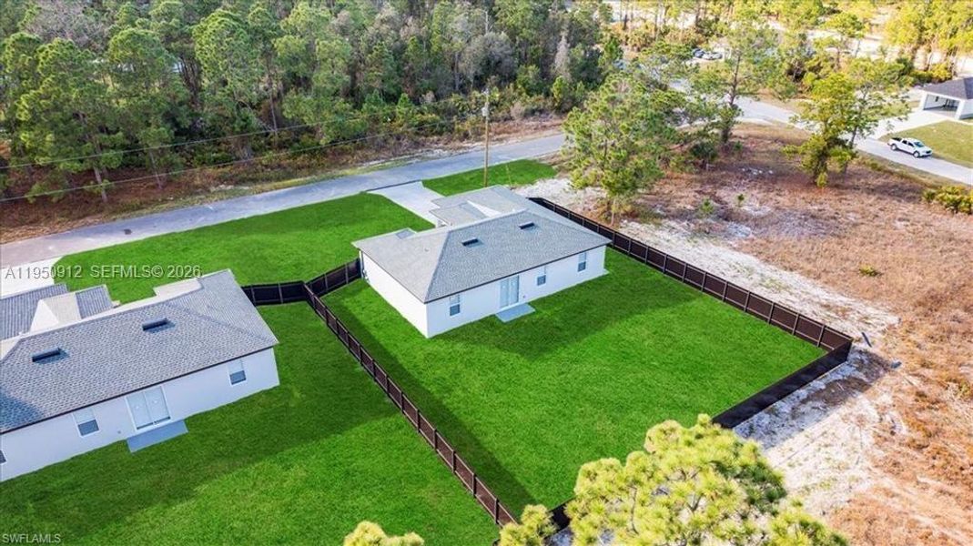 Front exterior of a new home in , Lehigh Acres, FL, highlighting curb appeal (Image 24).