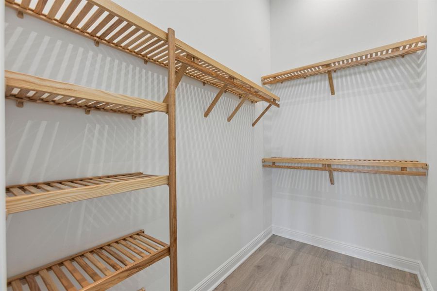 Furnished interior view inside a new home in PGA Village Verano, Port St. Lucie (Image 9).