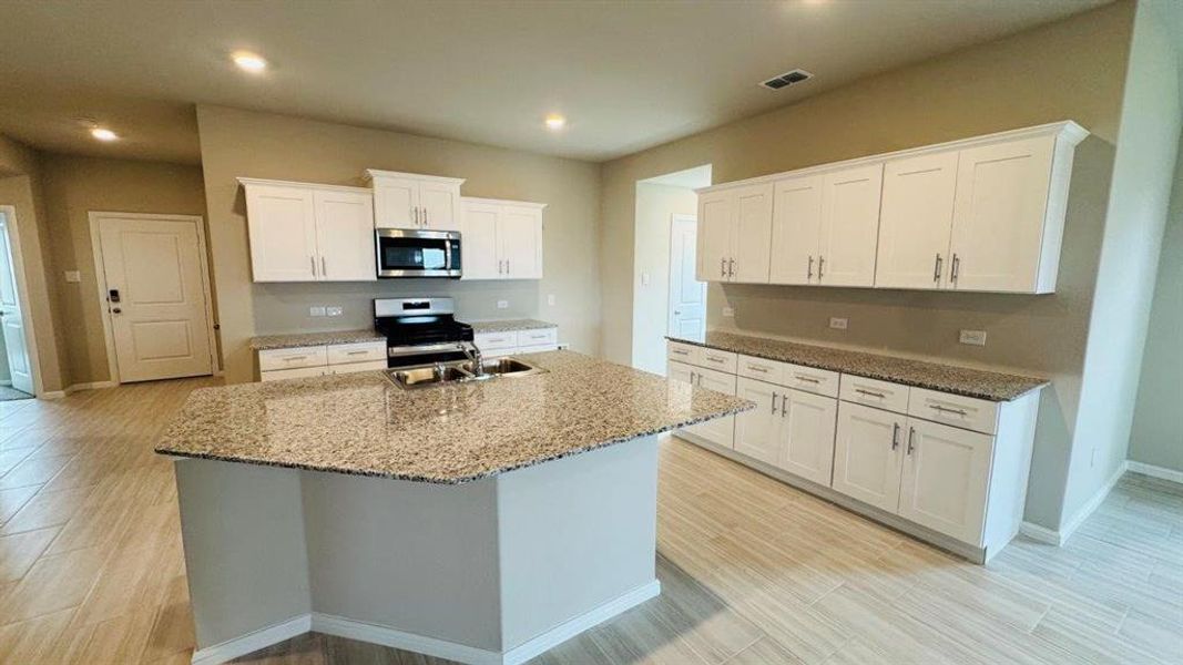 Furnished interior view inside a new home in Highlands at Chapel Creek, Fort Worth (Image 4).