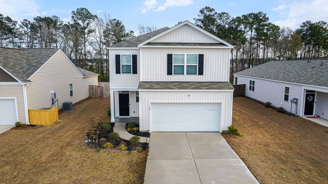 Front exterior of a new home in , Summerville, SC, highlighting curb appeal (Image 20).