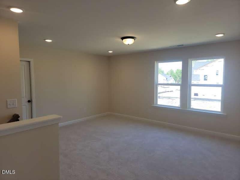 Spacious, unfurnished interior of a new home in Tobacco Road, Angier (Image 31).