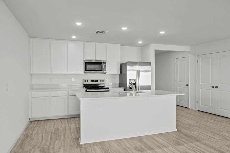 Furnished interior view inside a new home in Skyline Village Enclaves, San Tan Valley (Image 3).