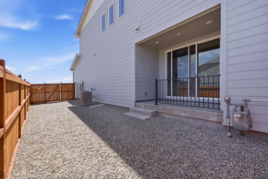 Exterior details and patio area of a home in Sky Ranch, Watkins (Image 4). Exterior details and patio area of a home in Sky Ranch, Watkins (Image 4).