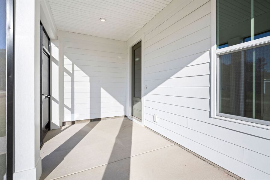 Exterior details and patio area of a home in Sun City Hilton Head, Bluffton (Image 3).