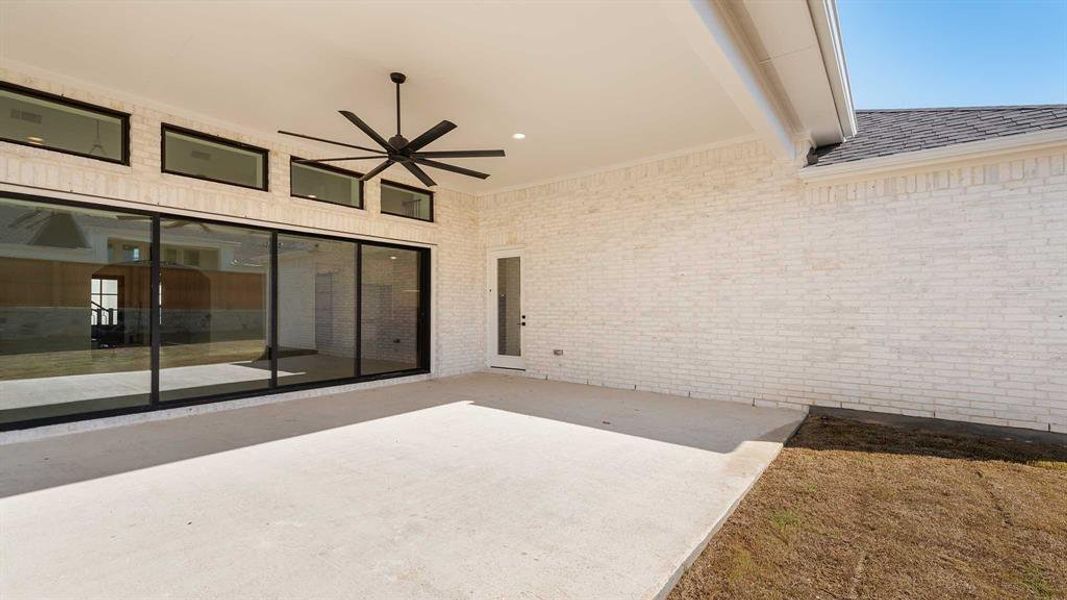 Exterior details and patio area of a home in Fields 60', Frisco (Image 3).