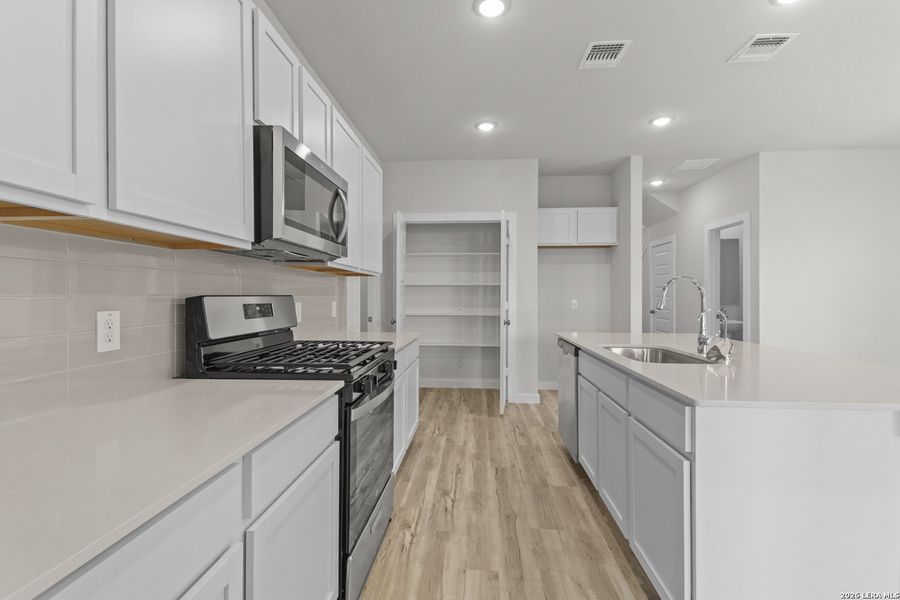 Furnished interior view inside a new home in Mesa Vista, San Antonio (Image 4).