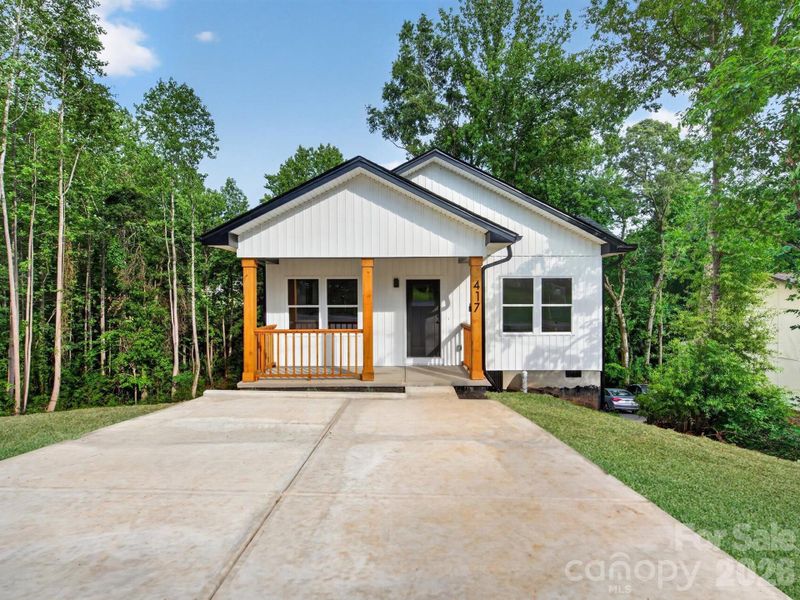 Front exterior of a new home in , Hickory, NC, highlighting curb appeal (Image 26).
